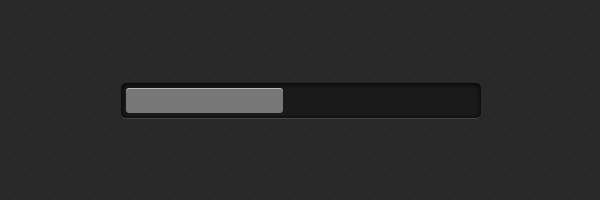 A grey CSS3 progress bar on a dark background